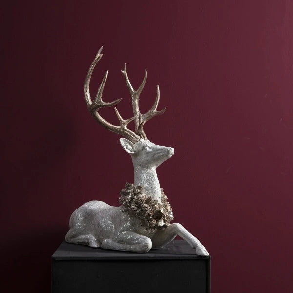 Deer with laurel wreath Lying