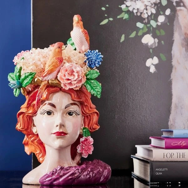 Vase woman's head with parrots