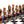 Load image into Gallery viewer, Jazz vs Rock Hand Painted Resin Chess Pieces+Glossy Black Wooden Chessboard
