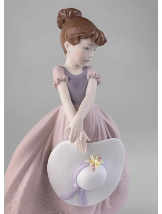 Straw hat in the Wind Girl Figurine