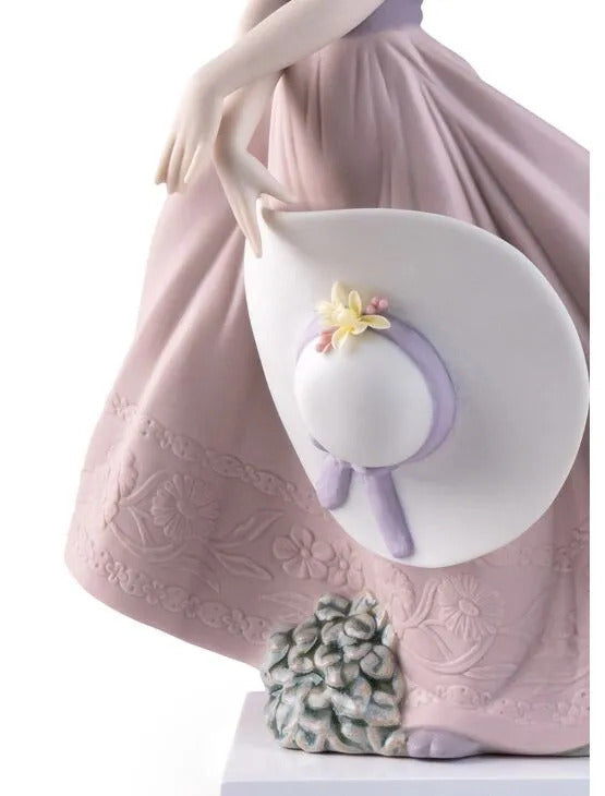 Straw hat in the Wind Girl Figurine