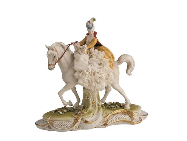 Lady riding horse