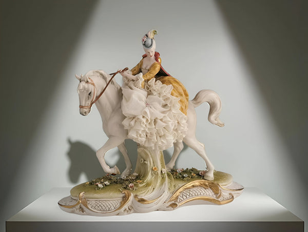 Lady riding horse