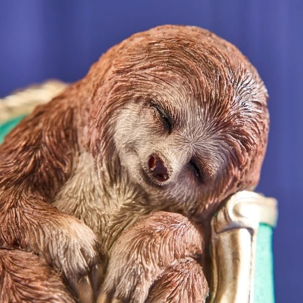 Sloth on armchair