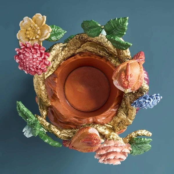 Vase woman's head with parrots