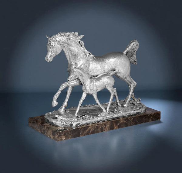 Silver mare with foal