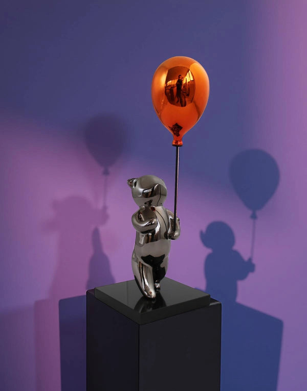 Little bear with balloon